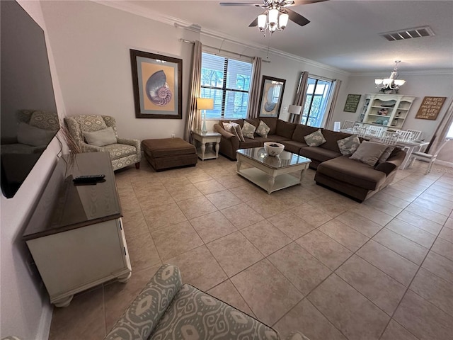 1452 Moon Valley Dr, Davenport, FL 33896 - living area featuring crown molding, light tile patterned floors, ceiling fan, and a chandelier
