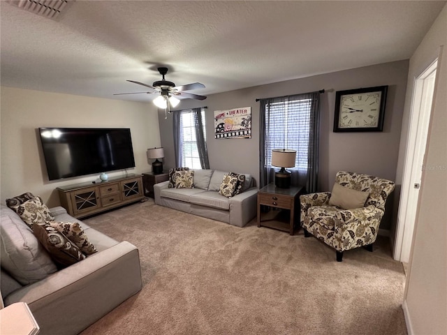 1452 Moon Valley Dr, Davenport, FL 33896 - carpeted living area with a ceiling fan
