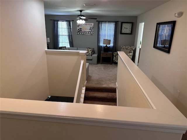 1452 Moon Valley Dr, Davenport, FL 33896 - stairway featuring carpet flooring and ceiling fan