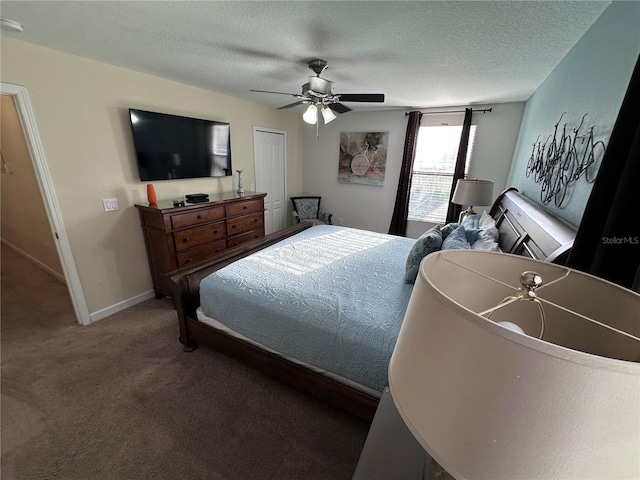 1452 Moon Valley Dr, Davenport, FL 33896 - carpeted bedroom featuring a textured ceiling and ceiling fan