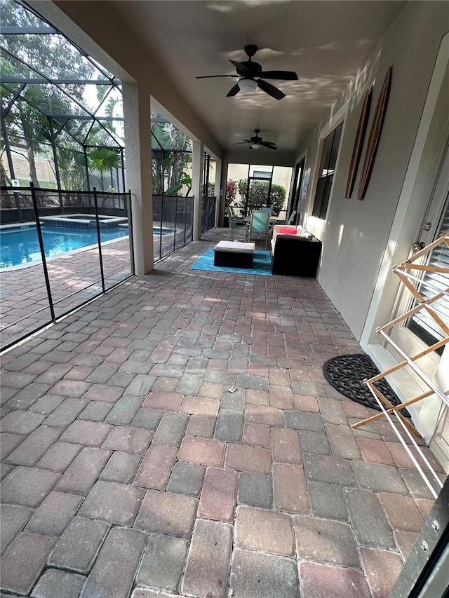 1452 Moon Valley Dr, Davenport, FL 33896 - view of patio / terrace with a ceiling fan, an outdoor pool, glass enclosure, and outdoor lounge area