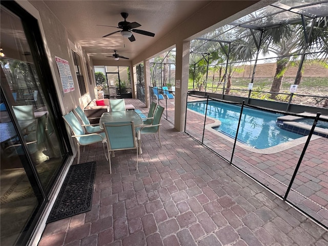 1452 Moon Valley Dr, Davenport, FL 33896 - view of pool featuring a pool with connected hot tub, a patio, a ceiling fan, a lanai, and outdoor dining space
