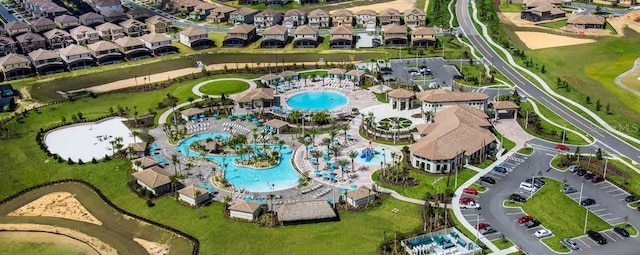 1452 Moon Valley Dr, Davenport, FL 33896 - aerial view of property and surrounding area featuring a pool and nearby suburban area