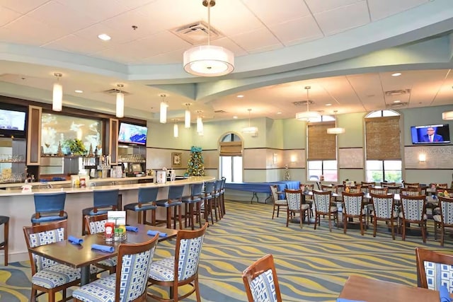 1452 Moon Valley Dr, Davenport, FL 33896 - carpeted dining space with healthy amount of natural light and recessed lighting