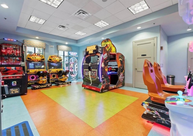 1452 Moon Valley Dr, Davenport, FL 33896 - game room with a drop ceiling, a tray ceiling, and tile patterned floors