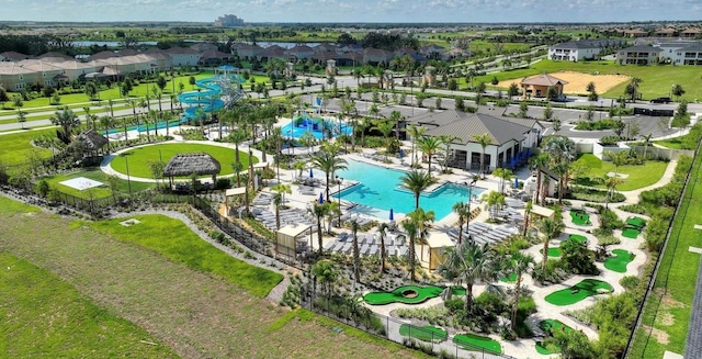1452 Moon Valley Dr, Davenport, FL 33896 - aerial perspective of suburban area with a pool