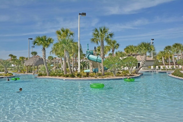 1452 Moon Valley Dr, Davenport, FL 33896 - community pool featuring a water slide and a gazebo