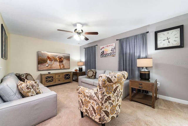 1452 Moon Valley Dr, Davenport, FL 33896 - living area featuring light carpet and a ceiling fan