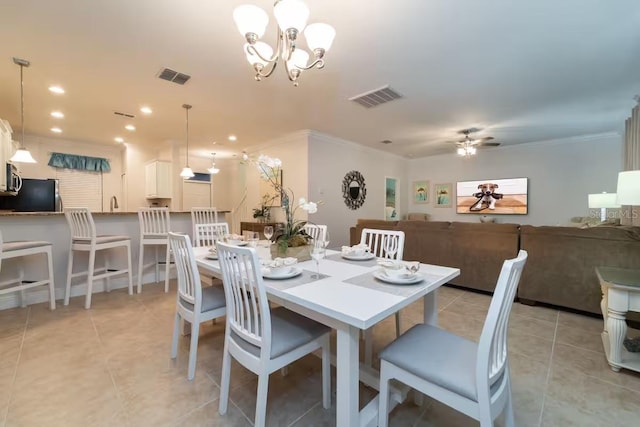 1452 Moon Valley Dr, Davenport, FL 33896 - dining room featuring light tile patterned floors, a ceiling fan, ornamental molding, a chandelier, and recessed lighting