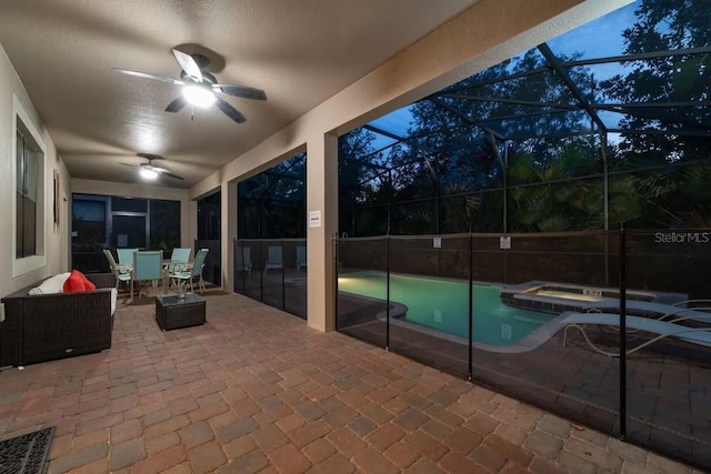 1452 Moon Valley Dr, Davenport, FL 33896 - view of pool featuring a patio area, a pool with connected hot tub, a lanai, a ceiling fan, and outdoor dining space