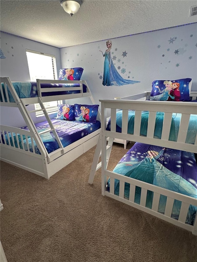 1452 Moon Valley Dr, Davenport, FL 33896 - carpeted bedroom with a textured ceiling
