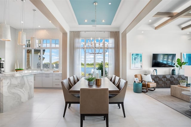 4007 Grande Brick Loop Unit 13, Orlando, FL 32837 - dining room featuring a chandelier, plenty of natural light, recessed lighting, and beam ceiling