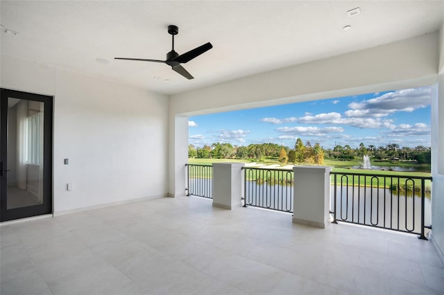 4007 Grande Brick Loop Unit 13, Orlando, FL 32837 - balcony featuring a water view and a ceiling fan