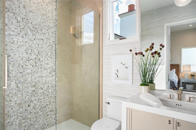 4007 Grande Brick Loop Unit 13, Orlando, FL 32837 - ensuite bathroom with a stall shower, vanity, and plenty of natural light