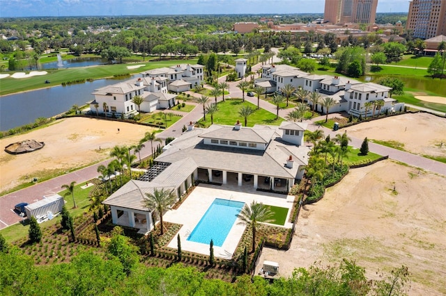4007 Grande Brick Loop Unit 13, Orlando, FL 32837 - aerial view of residential area with a nearby body of water and a pool area