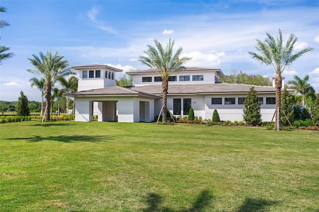 4007 Grande Brick Loop Unit 13, Orlando, FL 32837 - view of front of home featuring a front yard and stucco siding