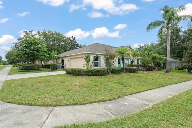 2042 Hayfield Way, Apopka, FL 32712 - view of front of house featuring concrete driveway, a front lawn, stucco siding, and an attached garage