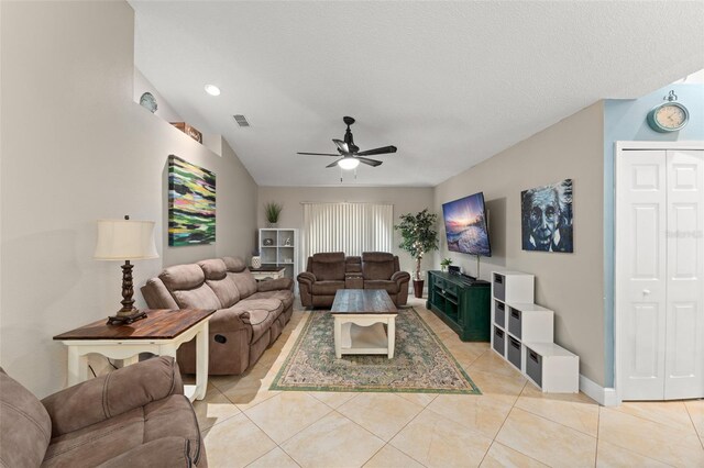 2042 Hayfield Way, Apopka, FL 32712 - living area with a ceiling fan, light tile patterned floors, and lofted ceiling