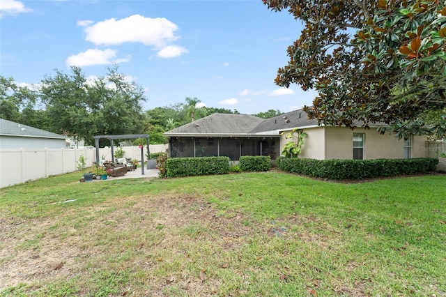2042 Hayfield Way, Apopka, FL 32712 - back of property featuring a sunroom, a pergola, a patio area, and stucco siding
