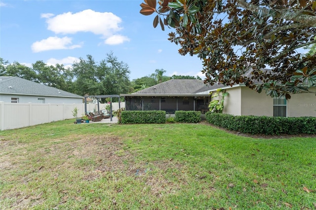 2042 Hayfield Way, Apopka, FL 32712 - back of property featuring a sunroom, stucco siding, and a patio area