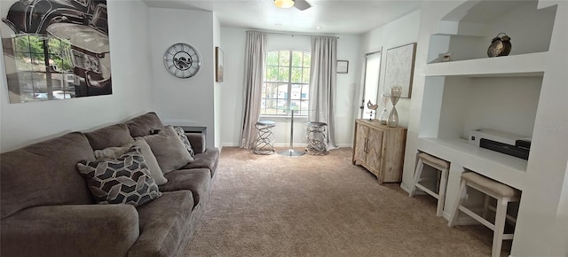 7220 Westpointe Blvd Unit 1429, Orlando, FL 32835 - living area featuring light carpet and baseboards