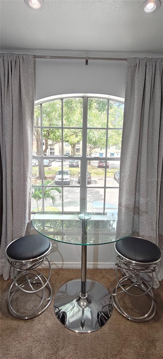 7220 Westpointe Blvd Unit 1429, Orlando, FL 32835 - dining space with healthy amount of natural light, recessed lighting, and a textured ceiling