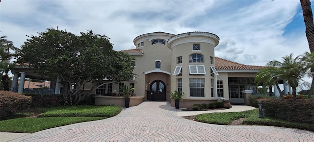 7220 Westpointe Blvd Unit 1429, Orlando, FL 32835 - view of front of home with stucco siding and a tiled roof