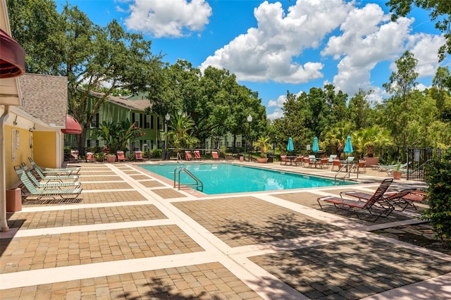 2041 Dixie Belle Dr Unit 2041C, Orlando, FL 32812 - community pool with a patio area