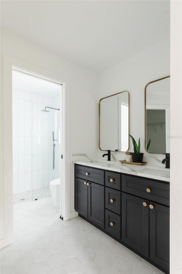 3920 Basswood Dr, Sarasota, FL 34232 - full bath featuring tiled shower, double vanity, and tile patterned floors