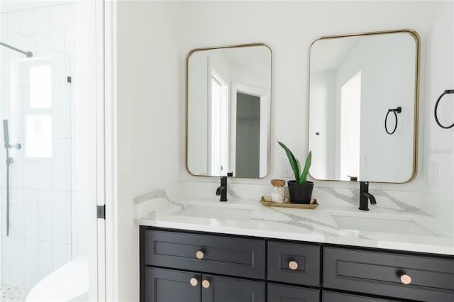 3920 Basswood Dr, Sarasota, FL 34232 - bathroom featuring a shower stall and double vanity