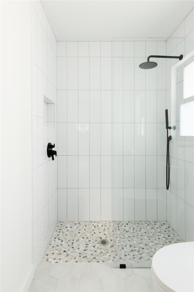3920 Basswood Dr, Sarasota, FL 34232 - full bath featuring tiled shower and tile patterned floors