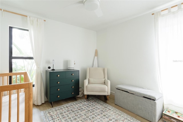 3920 Basswood Dr, Sarasota, FL 34232 - bedroom featuring light wood-style flooring and ceiling fan
