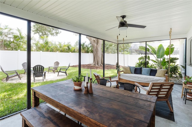 3920 Basswood Dr, Sarasota, FL 34232 - sunroom featuring an outdoor hangout area, ceiling fan, and outdoor dining space