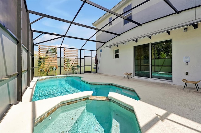 4429 Ganesha Loop, Kissimmee, FL 34746 - view of pool featuring a patio area, a pool with connected hot tub, and a lanai