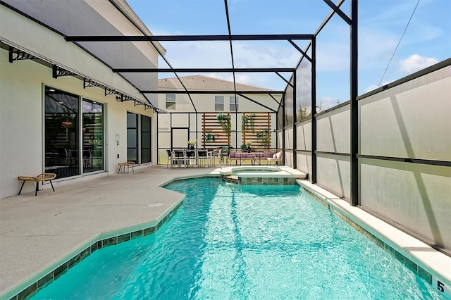 4429 Ganesha Loop, Kissimmee, FL 34746 - view of swimming pool featuring a patio area, a pool with connected hot tub, and a lanai