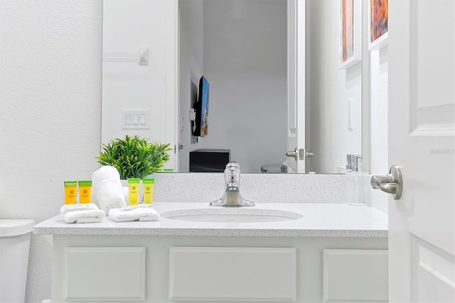 4429 Ganesha Loop, Kissimmee, FL 34746 - bathroom featuring vanity and toilet