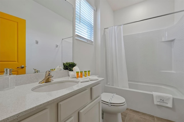 4429 Ganesha Loop, Kissimmee, FL 34746 - full bathroom featuring vanity, tile patterned flooring, and shower / bath combo with shower curtain