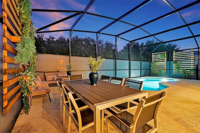 4429 Ganesha Loop, Kissimmee, FL 34746 - view of patio / terrace featuring a hot tub, glass enclosure, and outdoor lounge area