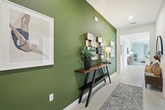 3220 Viridian Cir, West Melbourne, FL 32904 - hallway featuring baseboards and light tile patterned flooring
