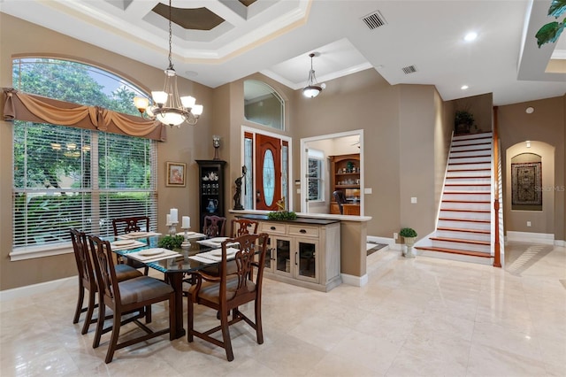 1224 Northern Way, Winter Springs, FL 32708 - dining area featuring a high ceiling, coffered ceiling, a chandelier, stairs, and ornamental molding