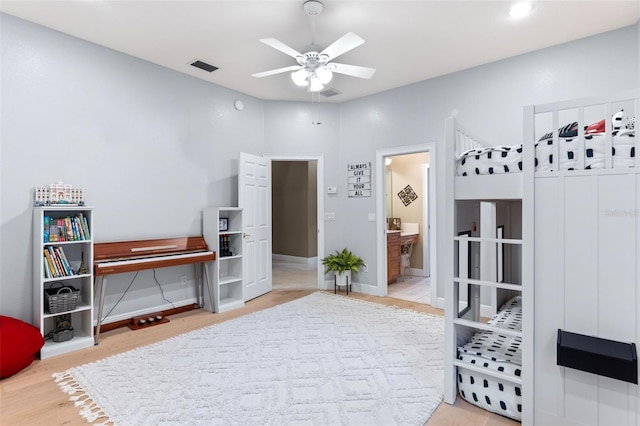 1224 Northern Way, Winter Springs, FL 32708 - bedroom with light wood-type flooring, ensuite bathroom, and ceiling fan