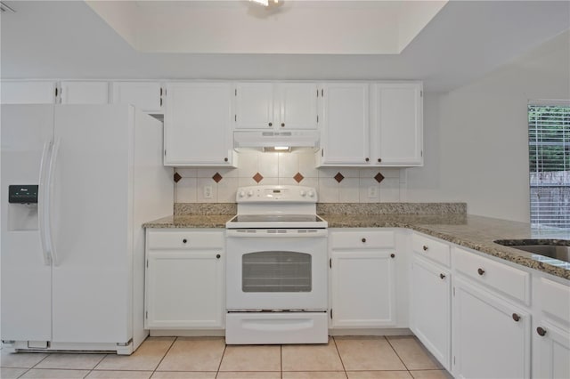1026 Mccully Ct, Oviedo, FL 32765 - kitchen with white appliances, under cabinet range hood, white cabinets, and light stone counters