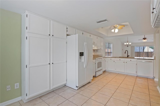 1026 Mccully Ct, Oviedo, FL 32765 - kitchen featuring white appliances, a ceiling fan, light tile patterned floors, and white cabinets