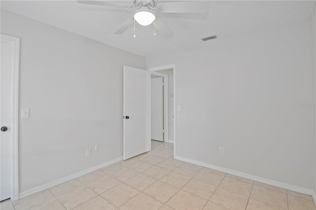1026 Mccully Ct, Oviedo, FL 32765 - empty room featuring ceiling fan and light tile patterned floors