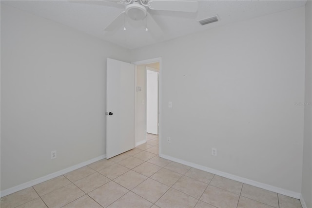 1026 Mccully Ct, Oviedo, FL 32765 - unfurnished room with a ceiling fan and light tile patterned floors