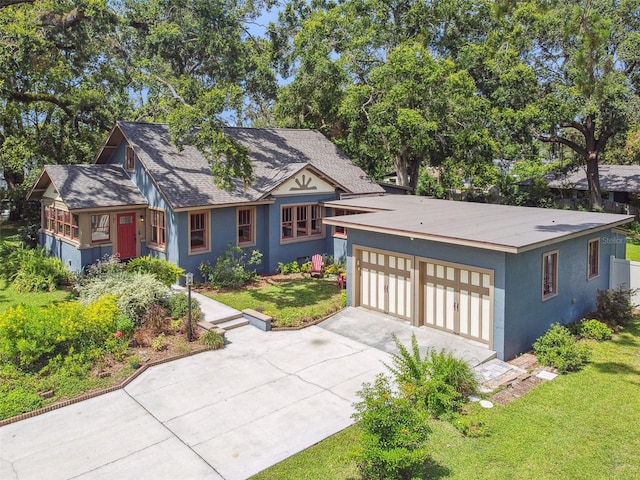524 S Lakeview Ave, Winter Garden, FL 34787 - tudor home with a front lawn, stucco siding, and concrete driveway