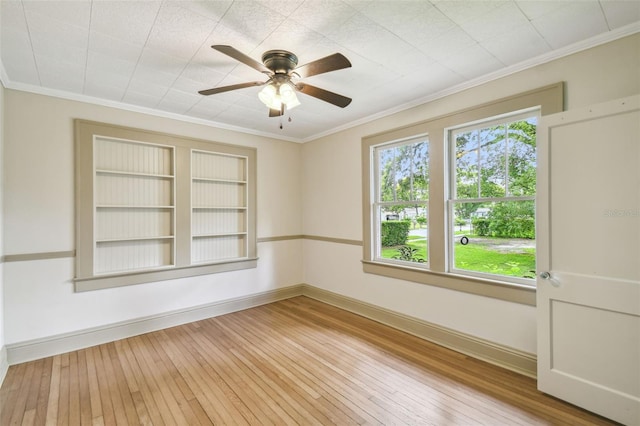 524 S Lakeview Ave, Winter Garden, FL 34787 - unfurnished room with wood-type flooring, crown molding, and a ceiling fan