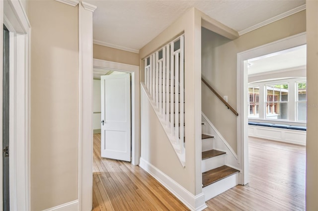 524 S Lakeview Ave, Winter Garden, FL 34787 - staircase featuring wood finished floors and crown molding
