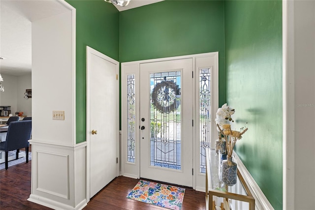 2220 Derbyshire Rd, Maitland, FL 32751 - entrance foyer featuring dark wood-style floors and a chandelier