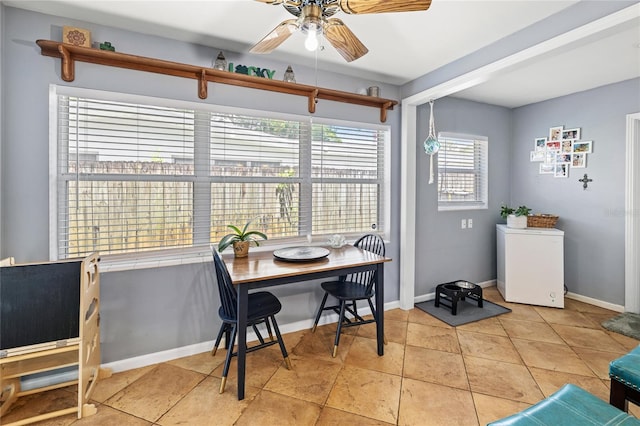 2220 Derbyshire Rd, Maitland, FL 32751 - dining space featuring ceiling fan and light tile patterned flooring